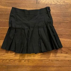Size 6- pleated black mini skirt Nasty Gal.